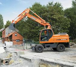 Kolová rypadla Doosan DX210W