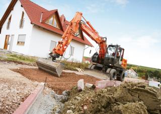 Kolová rypadla Hitachi ZX 140 W 3