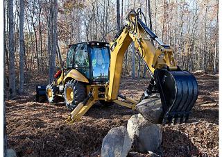 Rypadlo-nakladače Caterpillar 430F