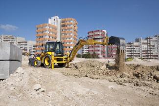 Rypadlo-nakladače New Holland B100C