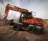 Kolová rypadla Doosan DX210W-5