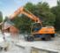 Kolová rypadla Doosan DX210W