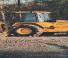 Rypadlo-nakladače John Deere Construction 710 B