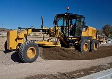 Grejdry Caterpillar 140 AWD