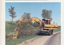Kolová rypadla Caterpillar 214B FT