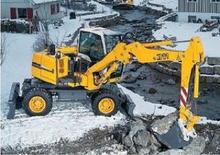 Kolová rypadla Liebherr A 310 PL