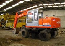 Kolová rypadla Hitachi EX100WD