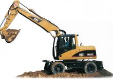 Kolová rypadla Caterpillar M 313 C VAH
