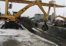 Kolová rypadla Caterpillar M 318 C MH