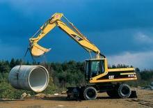 Kolová rypadla Caterpillar M 320 VAH