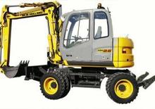 Kolová rypadla New Holland MH 2.6