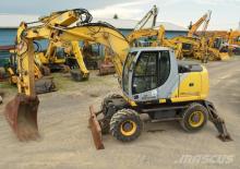 Kolová rypadla New Holland MH Plus