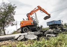 Kolová rypadla Hitachi ZX 140 W 5