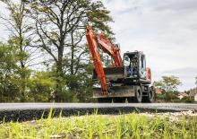 Kolová rypadla Hitachi ZX 140 W 5