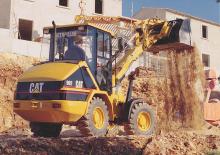 Kolové nakladače Caterpillar 902