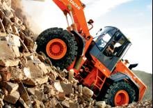 Kolové nakladače Hitachi LX 210 E