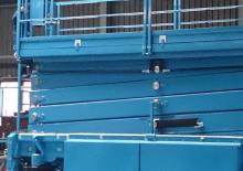 Kolové nůžkové plošiny Holland-Lift HL-330 E14
