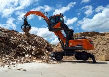 Manipulátory s materiálem Develon DX250WMH-7 