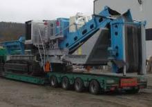 Mobilní čelisťové drtiče Sandvik Rock Processing Crawlmaster CM 1211 F