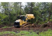 Pásové nakladače Caterpillar 973D