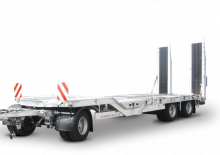 Podvalníky Schwarzmüller 3-axle low loader trailer with wheel recesses for transporting construction machinery