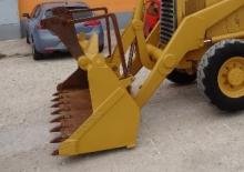 Rypadlo-nakladače Caterpillar 428 B 4x4 Tele