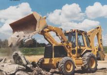Rypadlo-nakladače Caterpillar 446