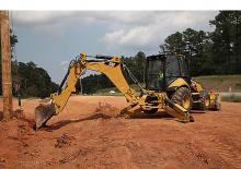 Rypadlo-nakladače Caterpillar 450F