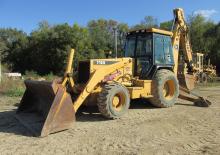 Rypadlo-nakladače John Deere Construction 710 D