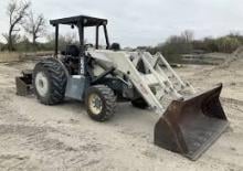 Rypadlo-nakladače Terex TX640