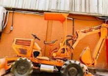Rypadlo-nakladače Komatsu WB 04