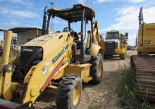 Rypadlo-nakladače Komatsu WB 142-5