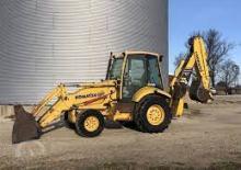 Rypadlo-nakladače Komatsu WB 150-2