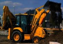 Rypadlo-nakladače Komatsu WB91R-5