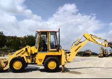 Rypadlo-nakladače Komatsu WB92A