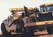 Skrejpry Caterpillar 613C