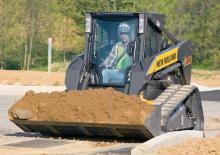 Smykem řízené nakladače New Holland C185