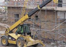Teleskopické manipulátory Caterpillar TH 63