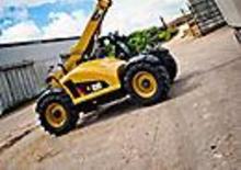 Teleskopické manipulátory Caterpillar TH406