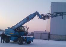 Teleskopické nakladače s horní konstrukcí Genie GTH 4020 R