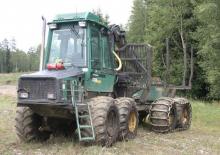 Vyvážecí traktory Timberjack 1210 B